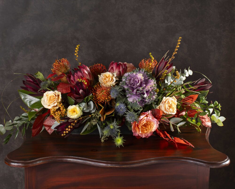 TRUDY<br><span>Fresh Textural Fall Florals in Shades of burgundy, orange, peach, coral and green</span>