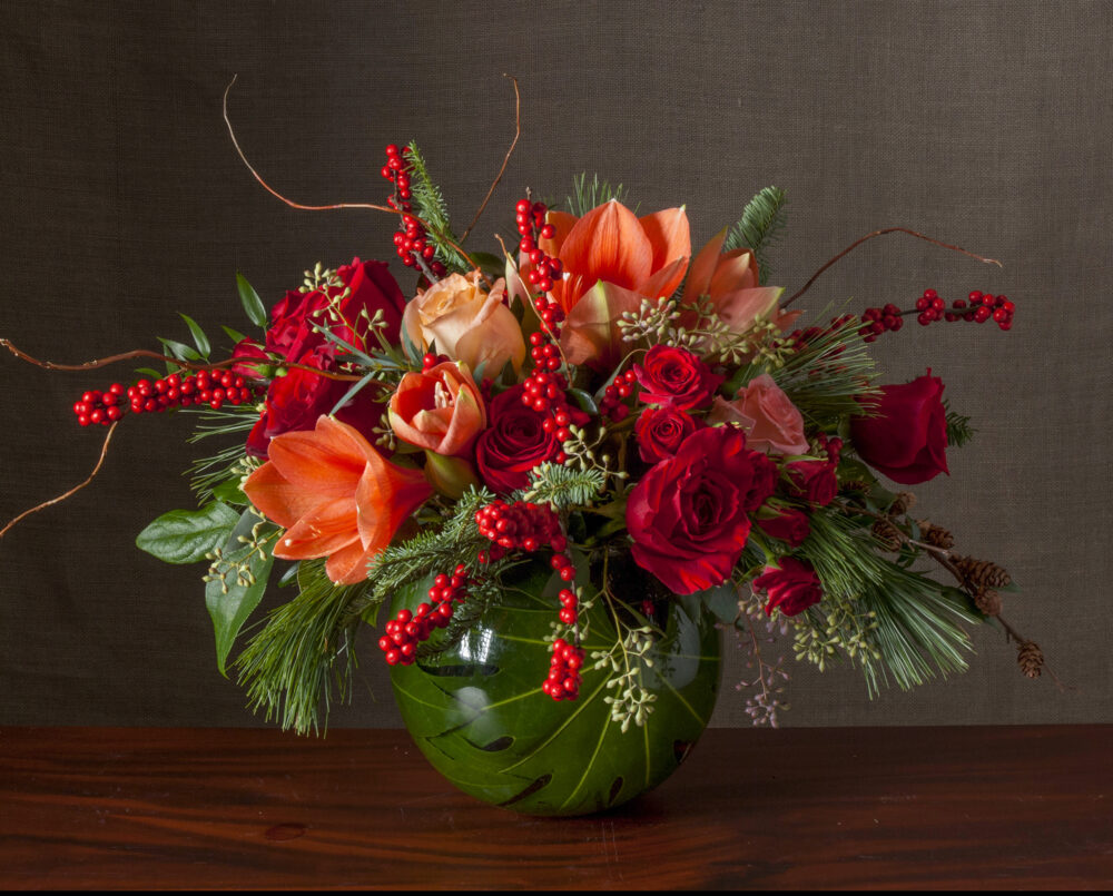 A bright, red, orange, peach, flower, arrangement, glass, bubble bowl, delivered, holidays, Christmas.