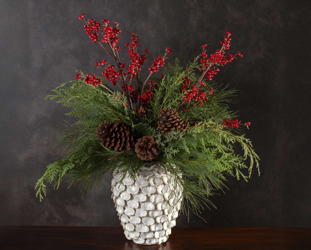 A beautiful, hand-sculpted, artisan vase with seasonal evergreen and red ilex berries, delivered, holiday, Christmas