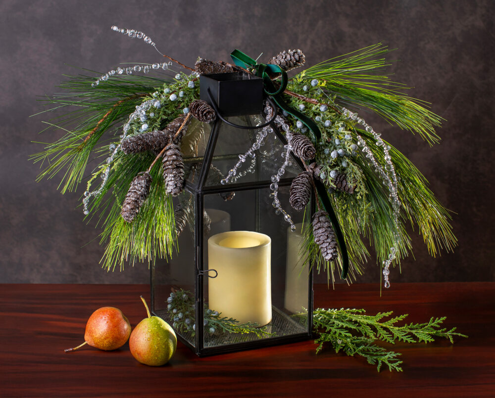 A beautiful glass lantern with seasonal winter décor and LED battery powered candle, delivery, Christmas, gifting.