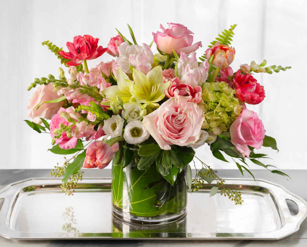 Camille is a soft and romantic spring arrangement in shades of light pink, white and green for valentine’s day.